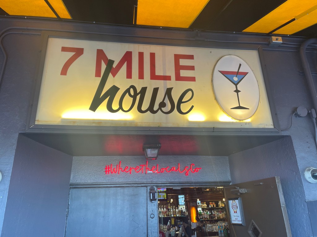 7 Mile House Sports Bar & Grill, door sign