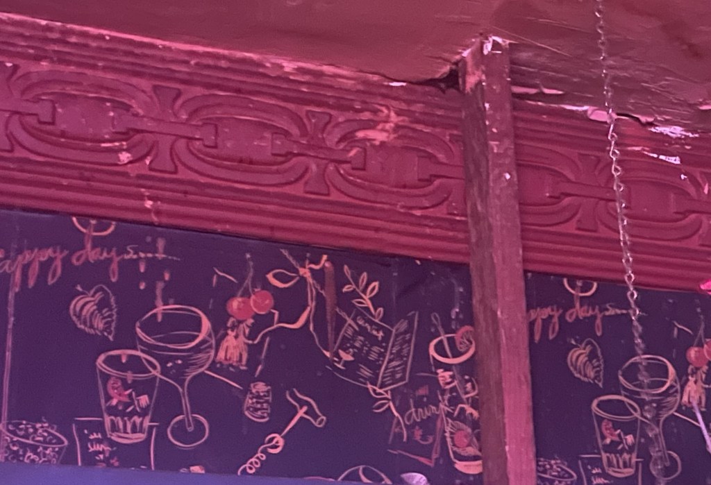 photo of original wallpaper and decor of Grandma's Saloon, San Francisco