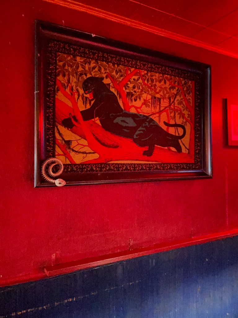 photo of a painting in The Phone Booth bar, San Francisco, CA
