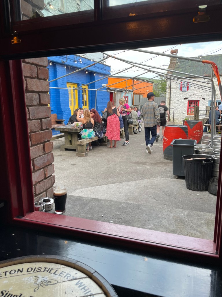 photo of a window in Dick Mack's Pub, Dingle, Ireland