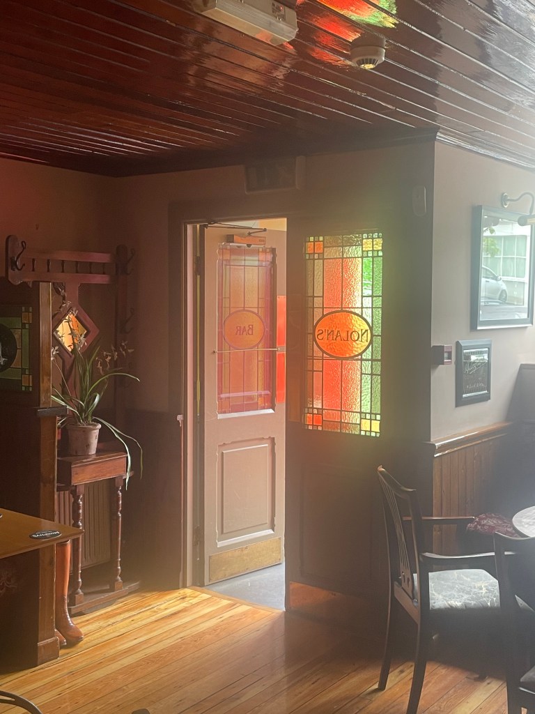 photo of the door of Nolans Bar, Rosscarbery. Ireland