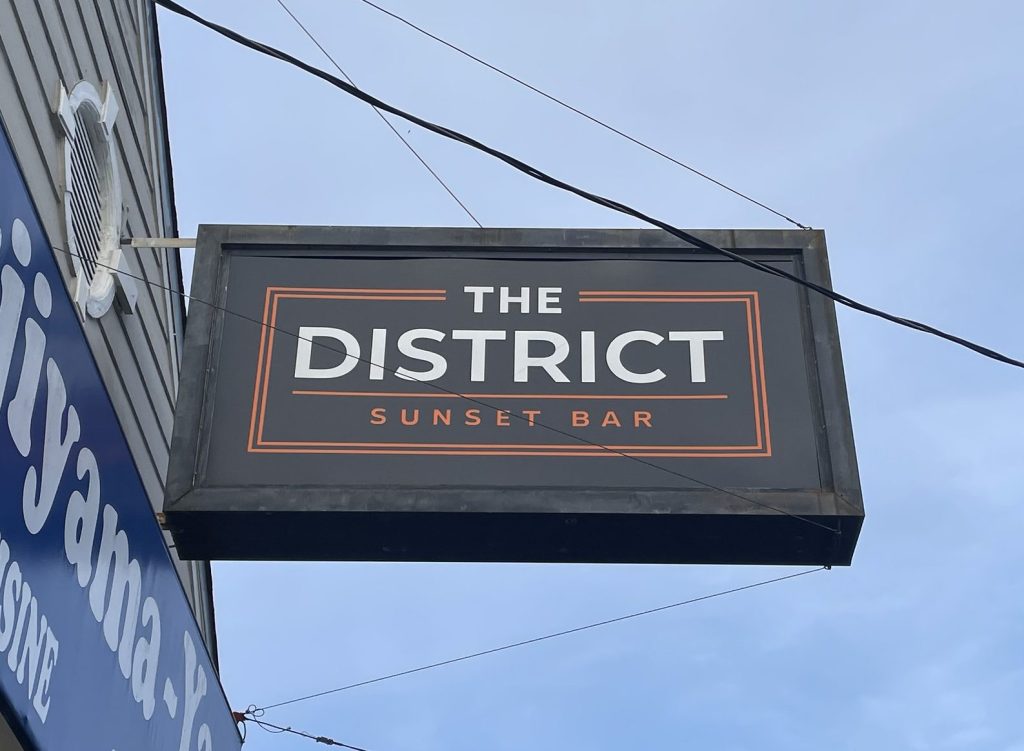 photo of The District Bar sign, SF